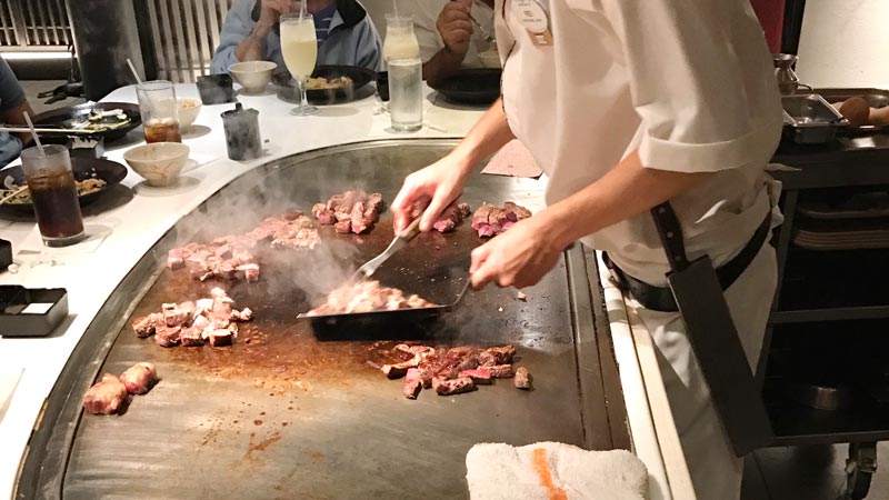 Cooking steak at Teppan Edo